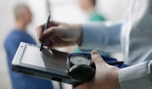 Doctor using electronic notepad